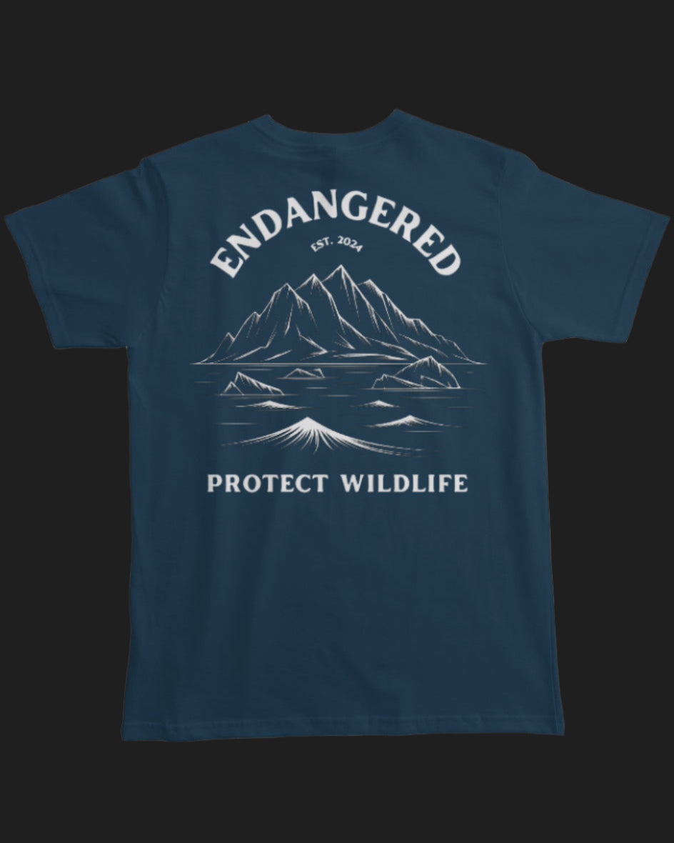 Navy blue t-shirt with mountain graphic and 'Endangered Protect Wildlife' text on a white background