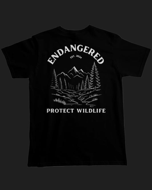 Black t-shirt with white graphic design and text on a white background