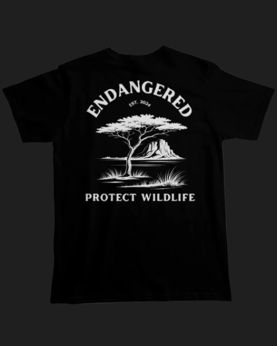 Black t-shirt with white graphic and text 'Endangered Protect Wildlife' on a white background