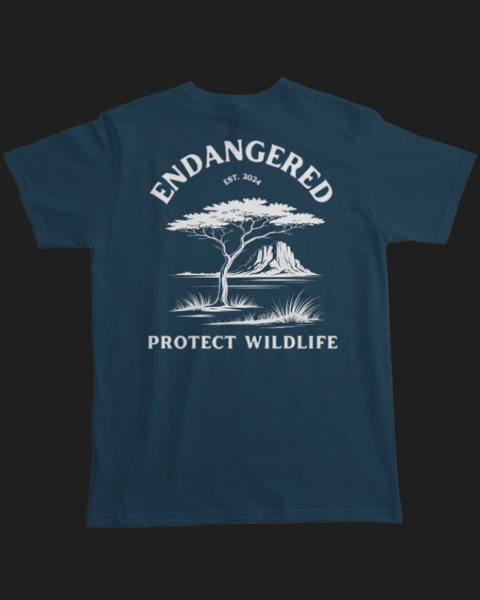 Blue t-shirt with white graphic and text 'Endangered Protect Wildlife' on a black background