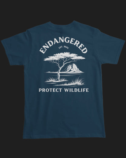 Blue t-shirt with white graphic and text 'Endangered Protect Wildlife' on a black background